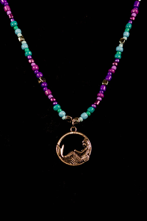 Andie handcrafted turquoise purple blue and silver beaded necklace on black velvet surface — Amelia Heir Art