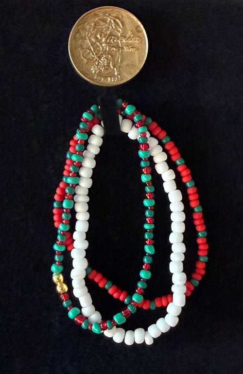 Buddy Christmas bracelet set with red, white, green, and gold beads — handmade holiday jewelry by Amelia Heir Art Design