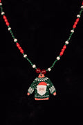 Christmas necklace with a Santa Claus sweater pendant on a black background