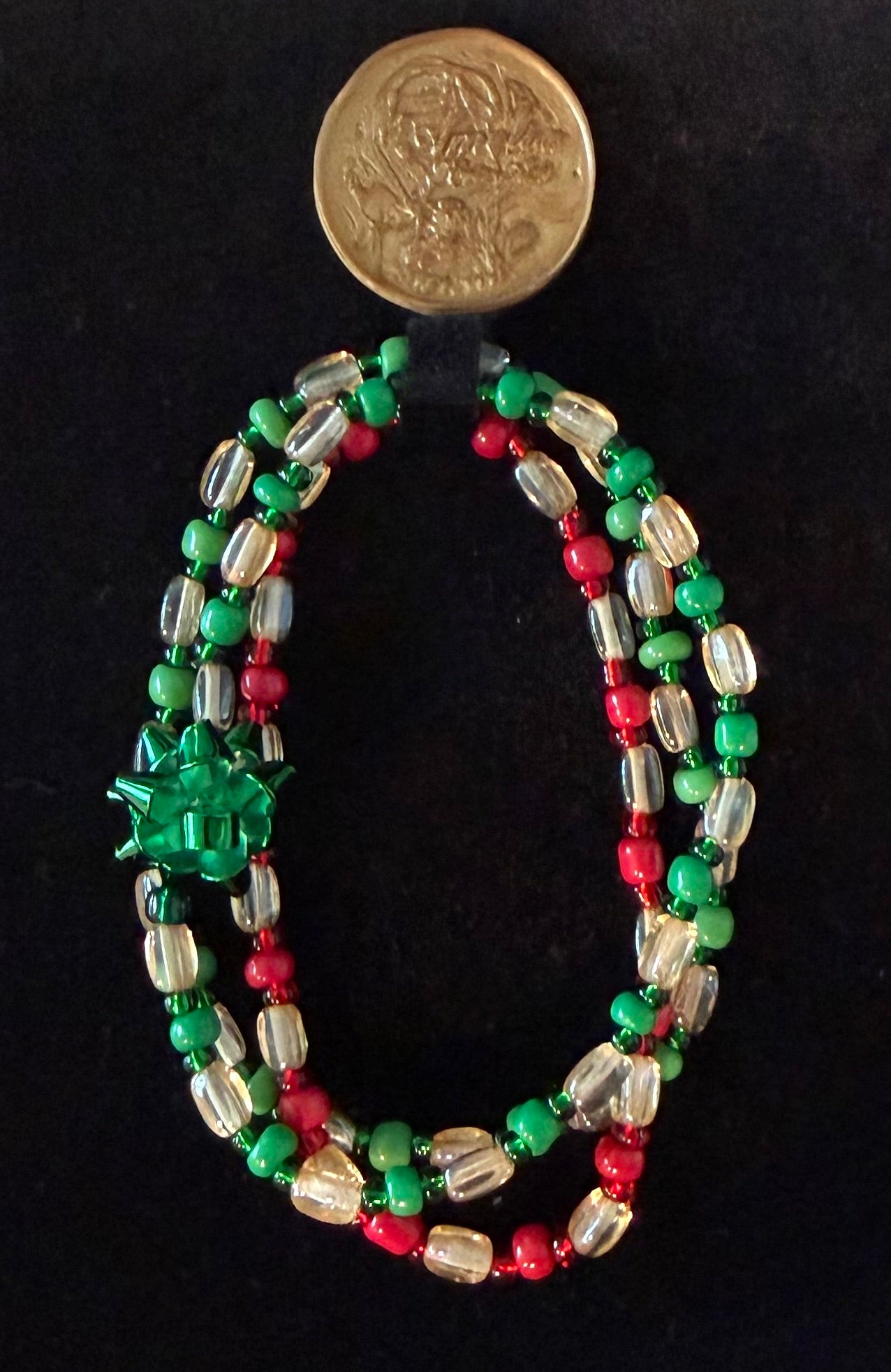 Present handcrafted red, green & ivory Christmas beaded bracelet with green gift bow charm — Amelia Heir Art