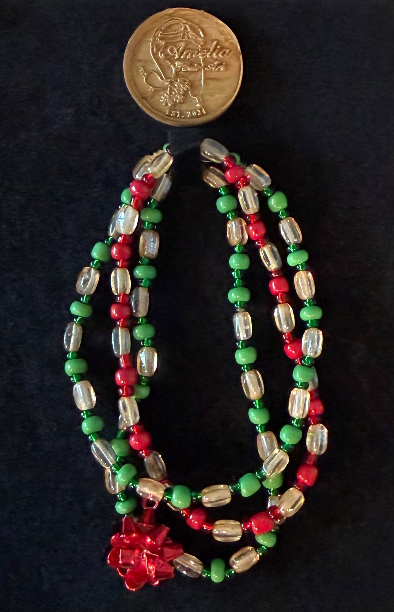 Present handcrafted red, green & ivory Christmas beaded bracelet with red gift bow charm — Amelia Heir Art