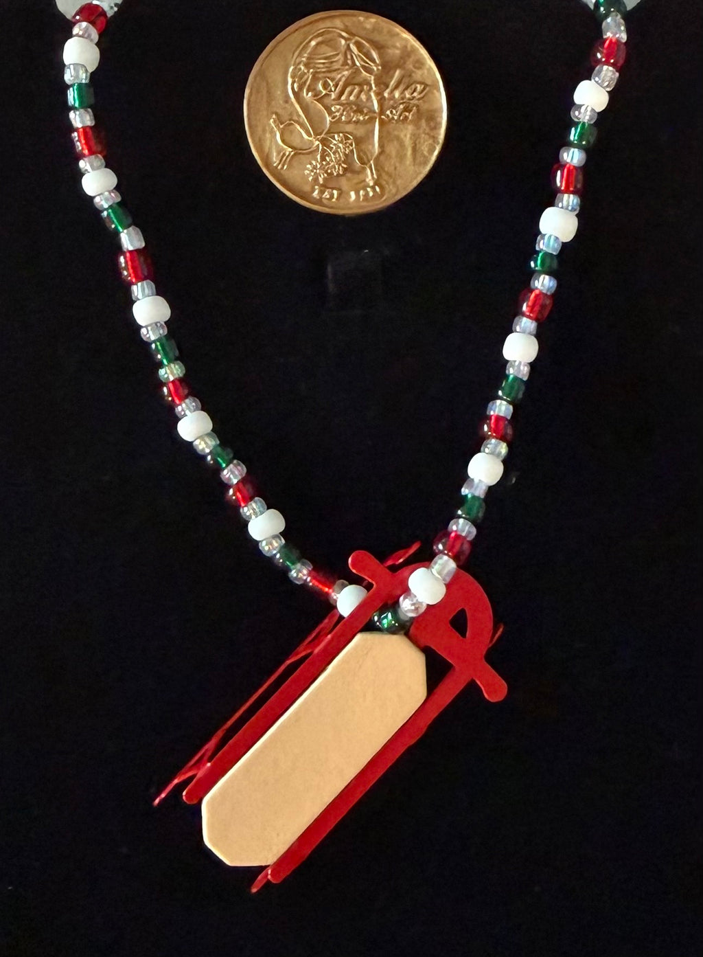 Sleighing handcrafted red, green, white & clear beaded necklace with vintage sled pendant — Amelia Heir Art